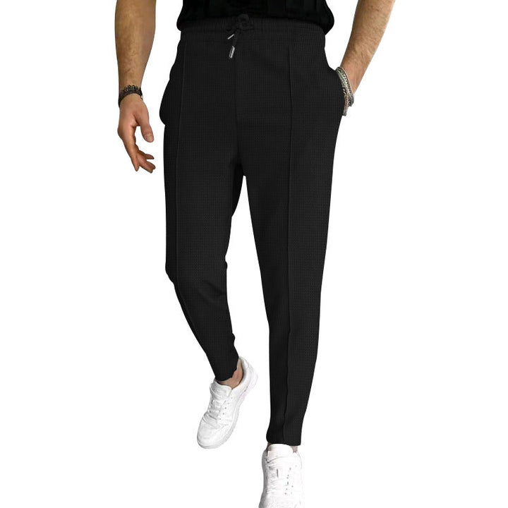 Herren nan schmal zulaufende Jogging-Chino aus strukturierter WNord Taschenqualität mit elastischem Tunnelzugbund und dekorativer Bügelfalte