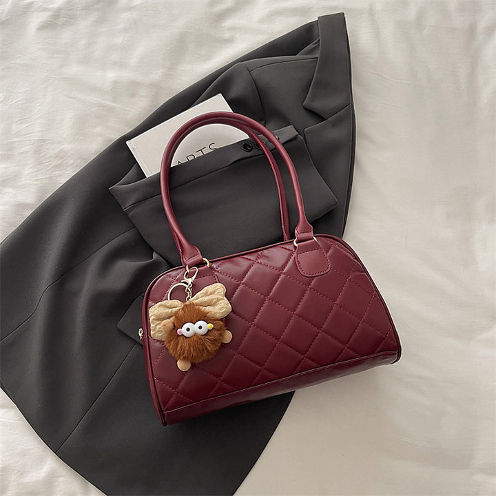 Damen modische Handtasche mit gestepptem Design und charmantem Anhänger Nord Taschen