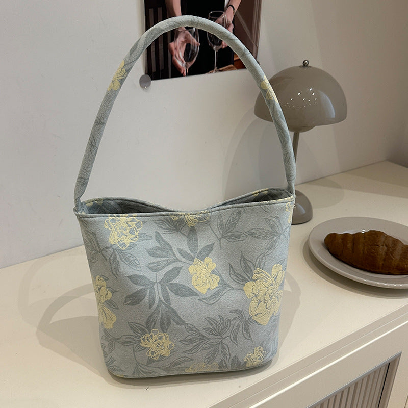 Damen Handtasche mit floralem Design und sanften Akzenten Nord Taschen