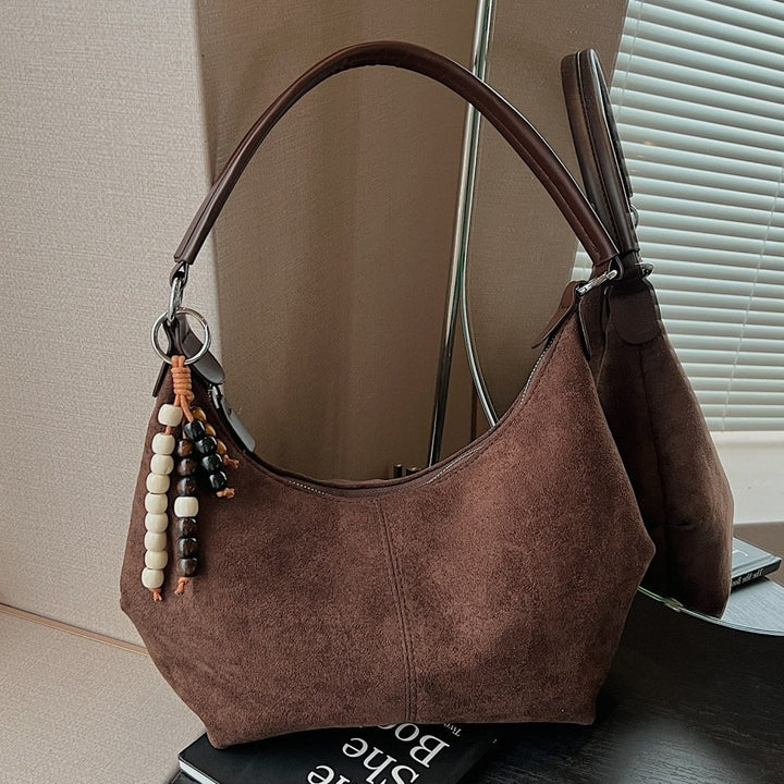 Damen Schultertasche mit eleganter Wildleder-Oberfläche Nord Taschen