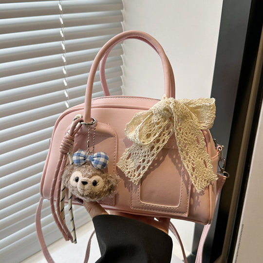 Damen Mini-Handtasche mit niedlichem Plüschanhänger und filigraner Schleifenverzierung Nord Taschen