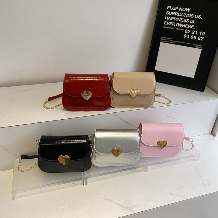 Damen elegante Umhängetasche mit Herzverschluss Nord Taschen