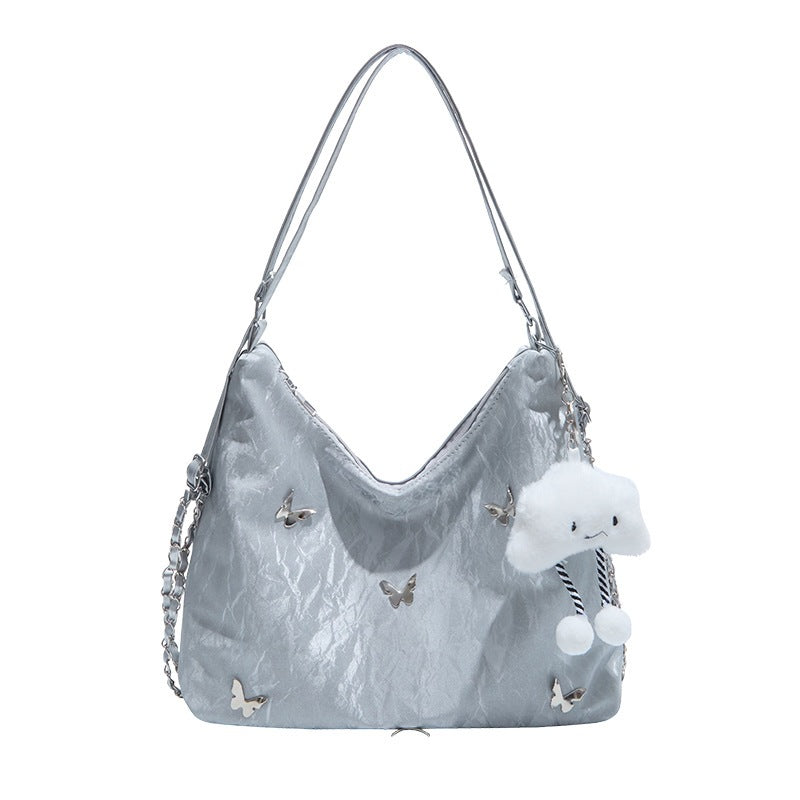 Damen modische Hobo-Tasche mit verspieltem Anhänger und detailreicher Verzierung Nord Taschen