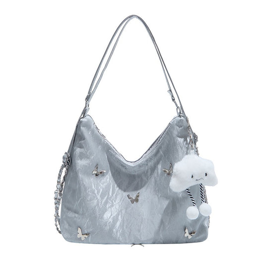 Damen modische Hobo-Tasche mit verspieltem Anhänger und detailreicher Verzierung Nord Taschen