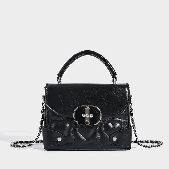 Damen Handtasche mit herzförmigem Design und schickem Kettenriemen Nord Taschen