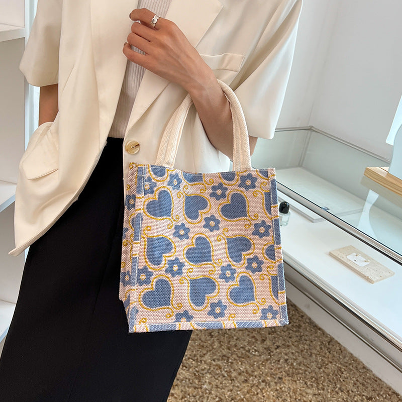 Damen Tragetasche mit floralem Herzdesign und stabilen Griffen Nord Taschen