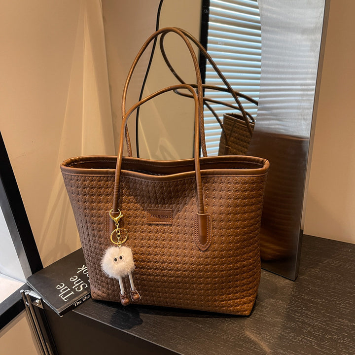 Damen elegante Beuteltasche aus geflochtenem Material Nord Taschen