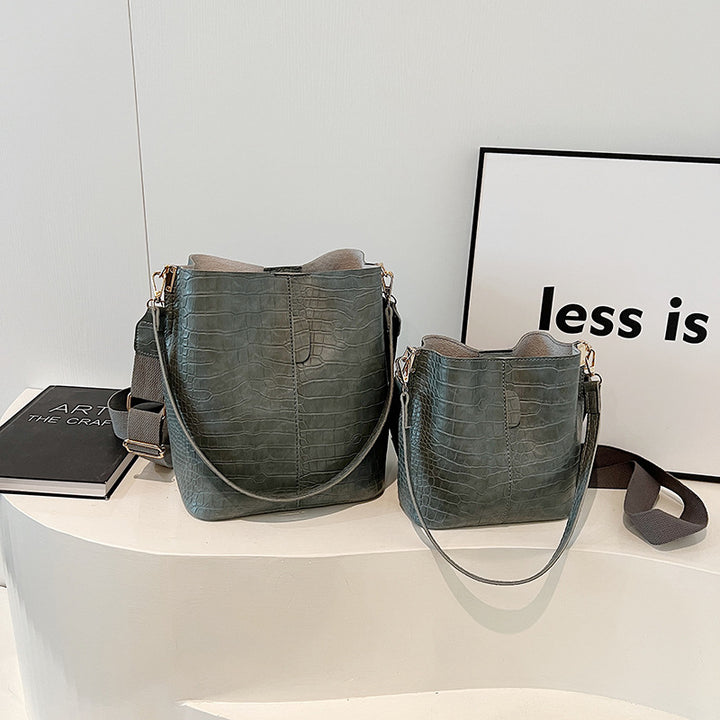 Damen-Handtasche im stilvollen Krokodil-Look mit verstellbarem Schulterriemen | Nord Taschen