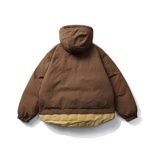 Unisex Kurz geschnittene wattierte Kapuzenjacke im Materialmix mit aufgesetzten Taschen Nord Taschen