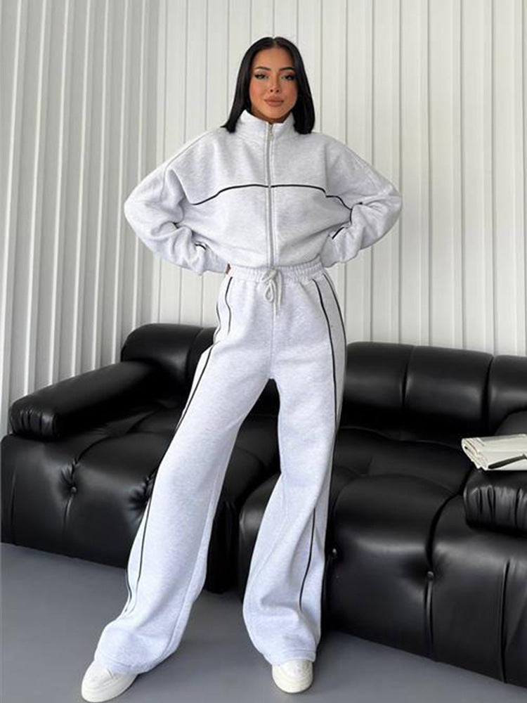Damen lässiges Sweatset mit Stehkragen Reißverschluss gekürzter Jacke und hochtaillierter Schlaghose Nord Taschen
