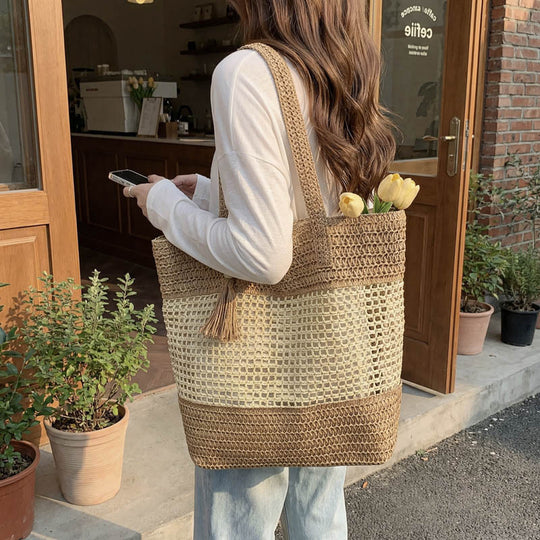Damen elegante Strandtasche mit ausgefallenem Häkel-Design und dekorativen Quasten Nord Taschen