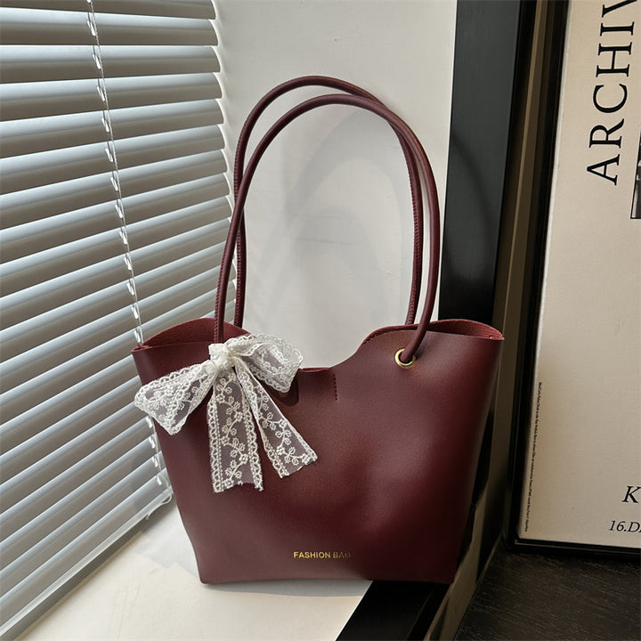 Damen Tote-Tasche aus hochwertigem Kunstleder mit verspieltem Schleifendetail Nord Taschen