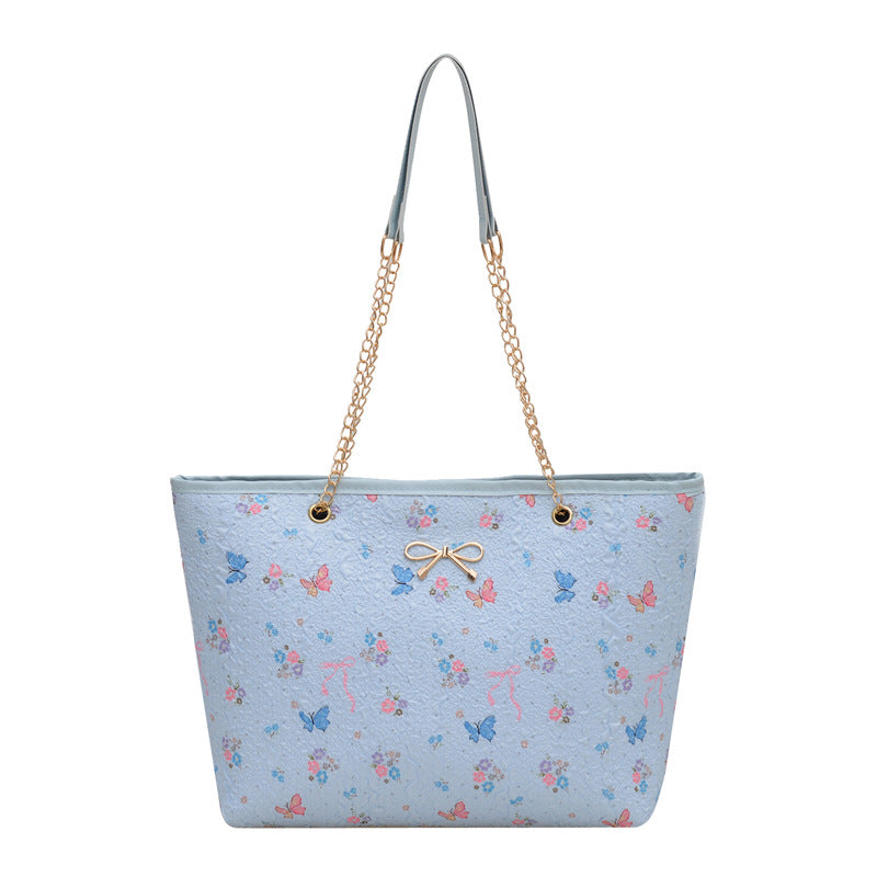 Damen Einkaufstasche mit floralem Design und elegantem Kettenakzent Nord Taschen