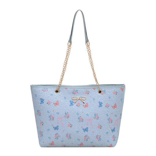Damen Einkaufstasche mit floralem Design und elegantem Kettenakzent Nord Taschen