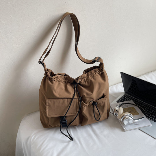 Damen Umhängetasche mit verstellbarem Kordelzug und praktischen Taschen Nord Taschen