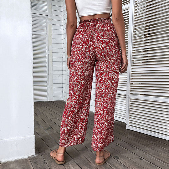 Damen Weite hochgeschnittene Palazzo‑Hose mit floralem Muster und seitlichem Beinschlitz Nord Taschen