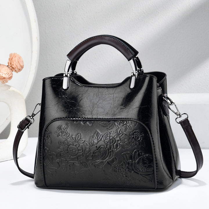 Damen elegante Handtasche mit floralem Relief Nord Taschen
