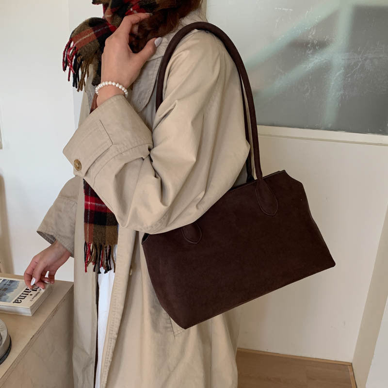 Damen elegante Handtasche aus weichem Kunstleder Nord Taschen