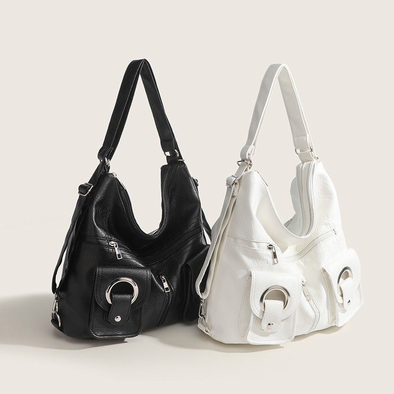 Damen Hobo-Tasche mit innovativem Faltendesign und dekorativen Ringgriffen Nord Taschen