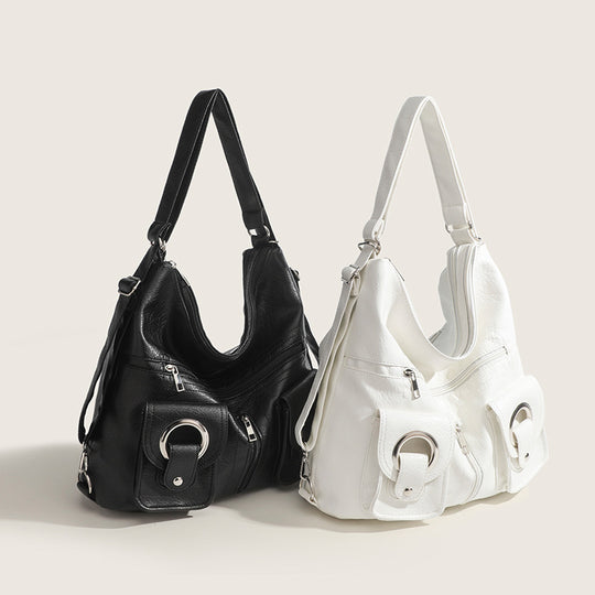 Damen Hobo-Tasche mit innovativem Faltendesign und dekorativen Ringgriffen Nord Taschen