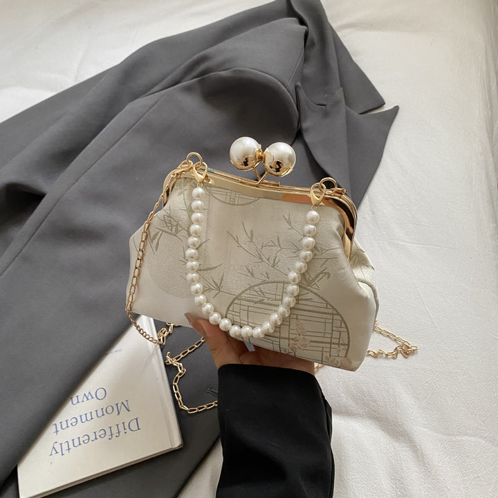 Damen Clutch mit elegantem Perlenschmuck Nord Taschen