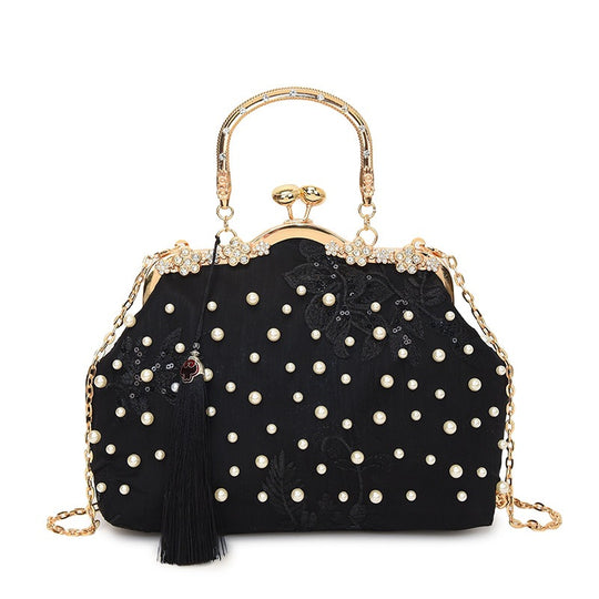Damen elegante Handtasche mit perlenverziertem Design und Metallakzenten Nord Taschen