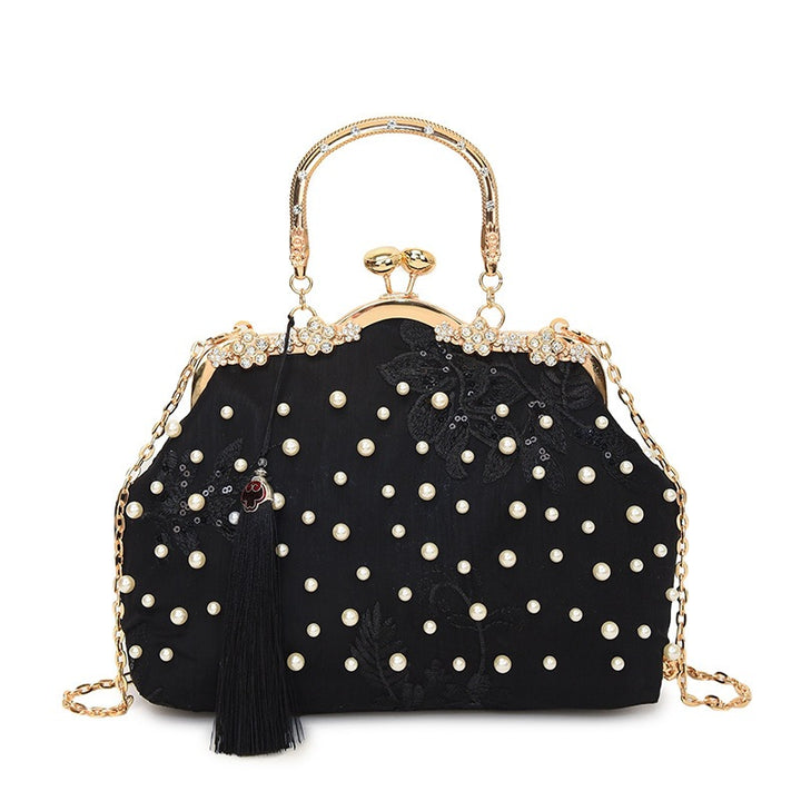 Damen elegante Handtasche mit perlenverziertem Design und Metallakzenten Nord Taschen