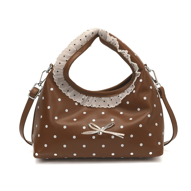 Damen Hobo-Tasche aus hochwertigem Kunstleder mit verspieltem Rüschendesign Nord Taschen