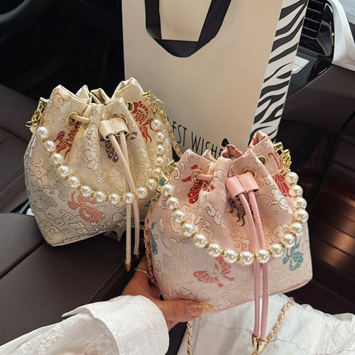 Damen Umhängetasche mit luxuriösem Perlenbesatz und floralen Details Nord Taschen