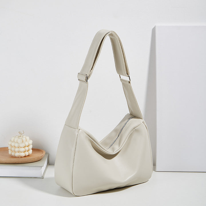 Damen Umhängetasche aus hochwertigem Kunstleder mit innovativem Faltendesign Nord Taschen