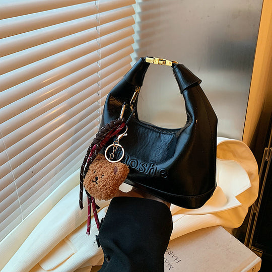 Damen elegante Hobo-Tasche mit plüschigem Anhänger Nord Taschen