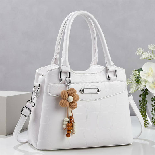Damen Handtasche mit stilvollem Kroko-Design und abnehmbarem Blumenanhänger Nord Taschen