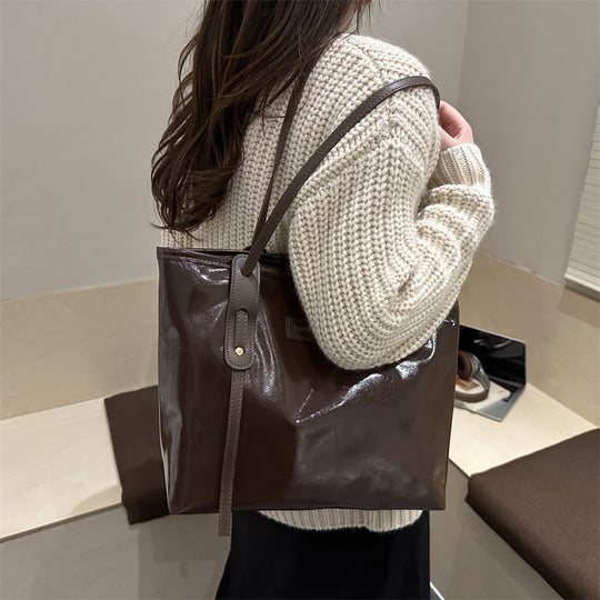 Damen elegante Ledereinkaufstasche mit schimmerndem Finish und abnehmbaren Schulterriemen Nord Taschen