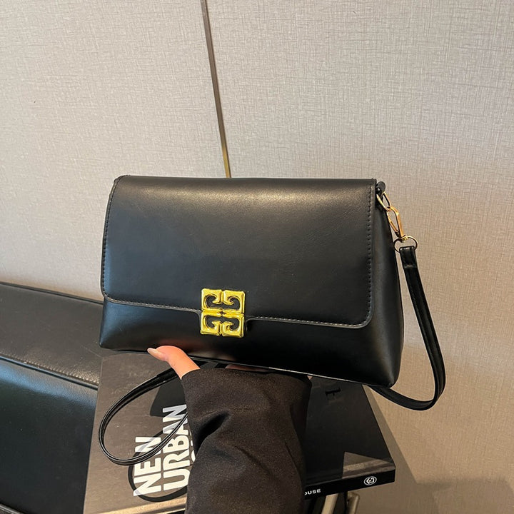Damen Umhängetasche mit elegantem Klappverschluss und luxuriösen Details Nord Taschen
