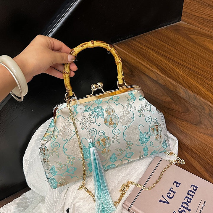 Damen elegante Handtasche mit Bambusgriffen und floralem Design Nord Taschen