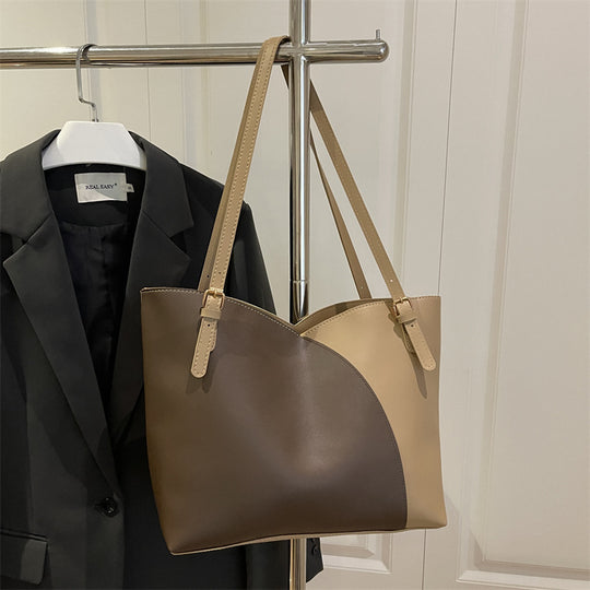 Damen elegante Handtasche mit asymmetrischem Design und robusten Trageriemen Nord Taschen