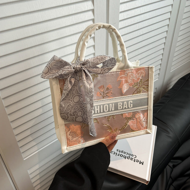 Damen Mini-Henkeltasche mit einzigartigem floralem Design und elegantem Schleifenakzent Nord Taschen