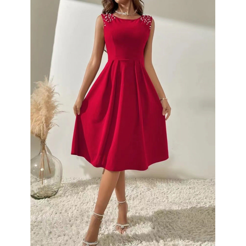 Damen Midi-Kleid mit dekorativen Perlenakzenten und schwingendem Rock