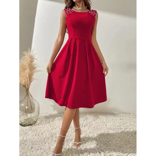 Damen Midi-Kleid mit dekorativen Perlenakzenten und schwingendem Rock
