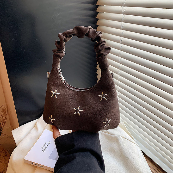 Damen modische Umhängetasche mit floralen Details und elastischem Tragegriff Nord Taschen