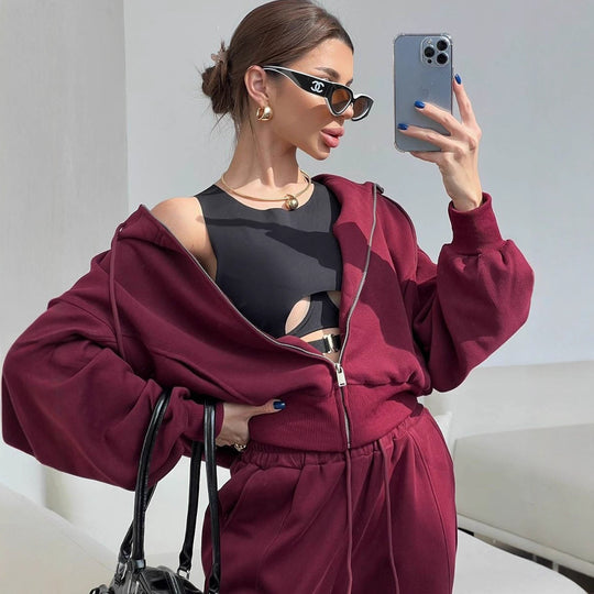 Damen kurzes Kapuzen-Sweatjacke mit Balloonärmeln und elastischer High-Waist Palazzo-Freizeithose Nord Taschen