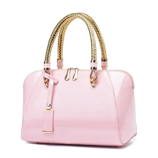 Damen Handtasche mit glänzender Oberfläche und eleganten Geflochtenen Griffen Nord Taschen