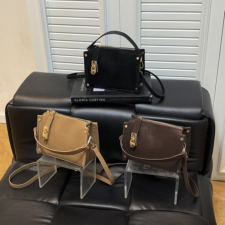 Damen Handtasche mit elegantem Reißverschluss und modernem Detail Nord Taschen
