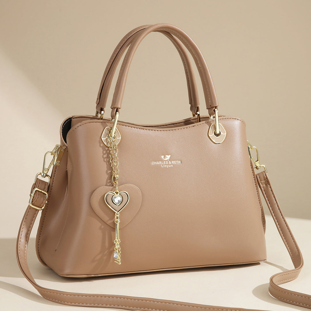 Damen elegante Handtasche mit Herzanhänger Nord Taschen