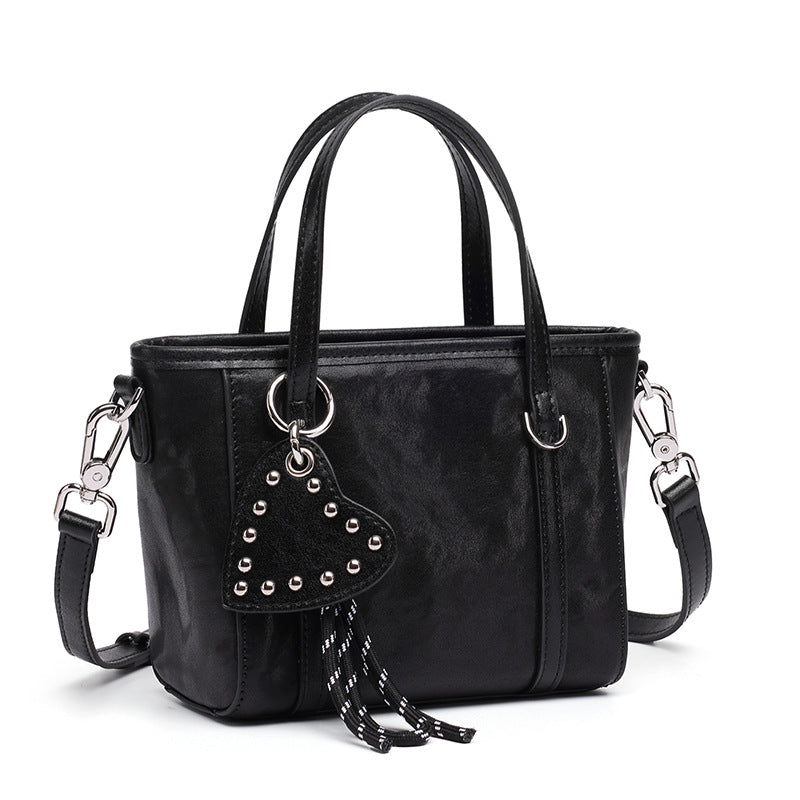 Damen modische Handtasche mit Herzanhänger und abnehmbarem Schulterriemen Nord Taschen
