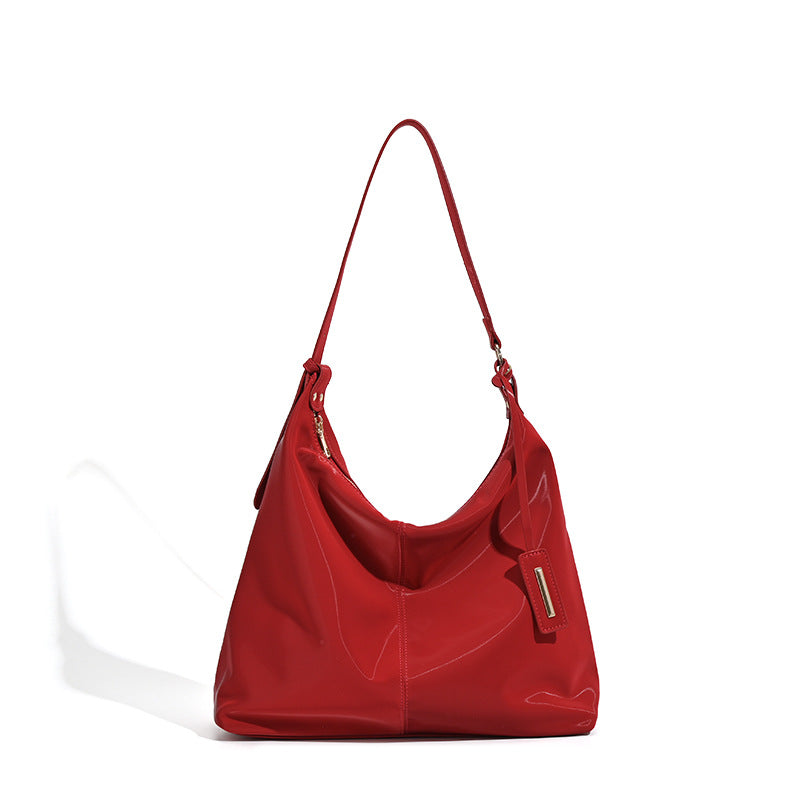Damen Hobo-Tasche mit glänzender Oberfläche und elegantem Design Nord Taschen