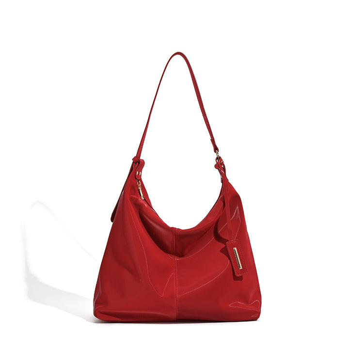 Damen Hobo-Tasche mit glänzender Oberfläche und elegantem Design Nord Taschen