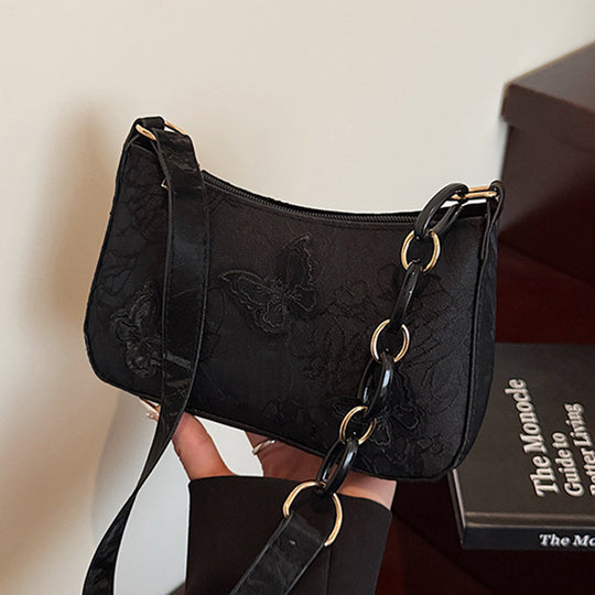 Damen Handtasche mit handgearbeitetem Blumenmuster und modischem Kettenriemen Nord Taschen