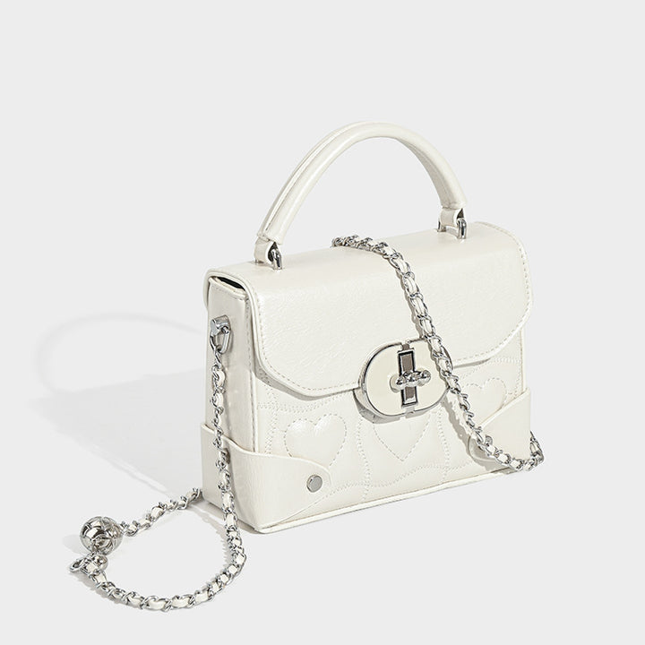 Damen Handtasche mit herzförmigem Design und schickem Kettenriemen Nord Taschen