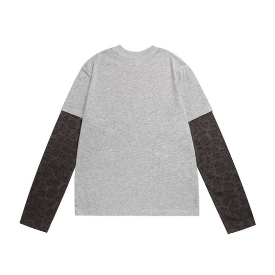 Damen Lagen-Langarmshirt mit Kontrastärmeln im Leo-Muster und Statement-Print Nord Taschen